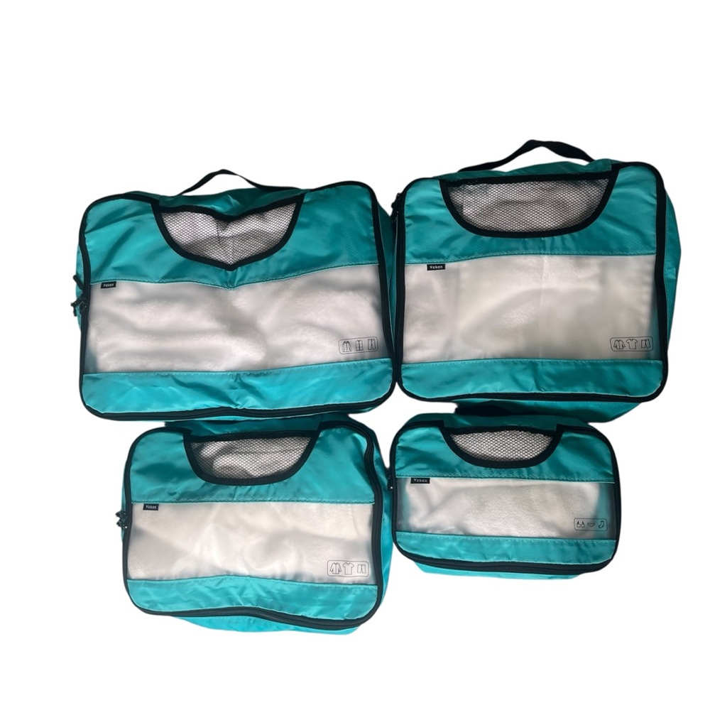 NWOT Teal and Clear Packing Cubes - Set of 4